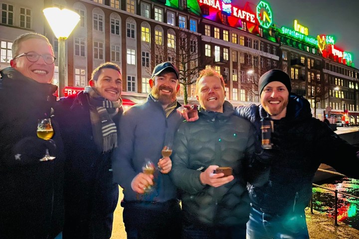 a group of people posing for the camera