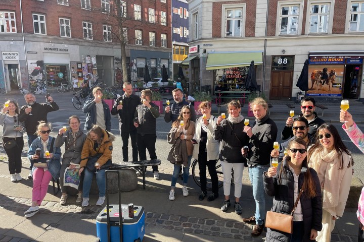 a group of people walking down the street