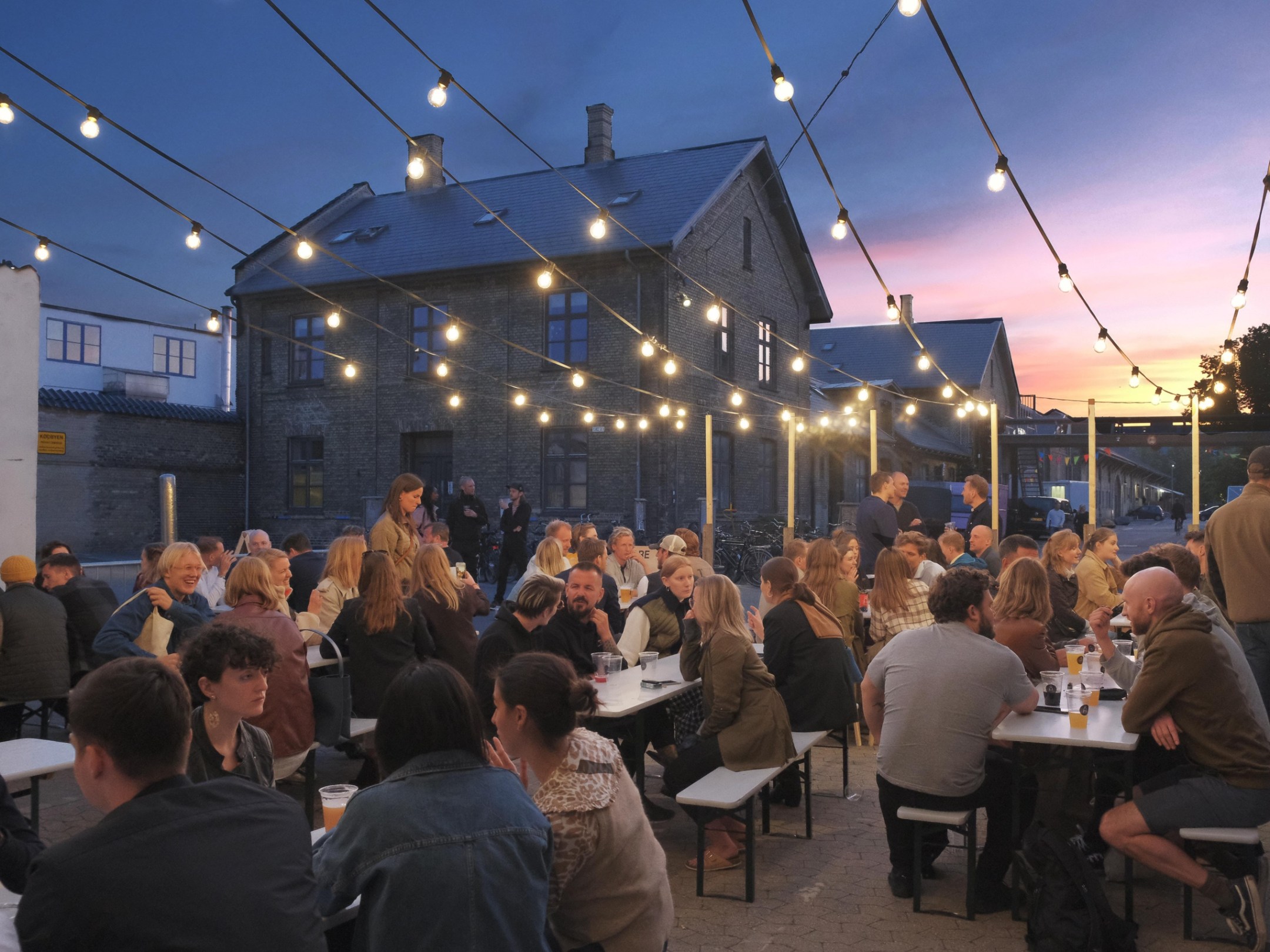 a group of people standing in front of a crowd