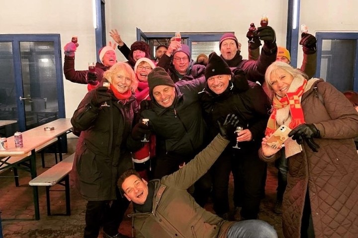 a group of people posing for the camera