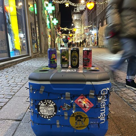 a blue suitcase on a street