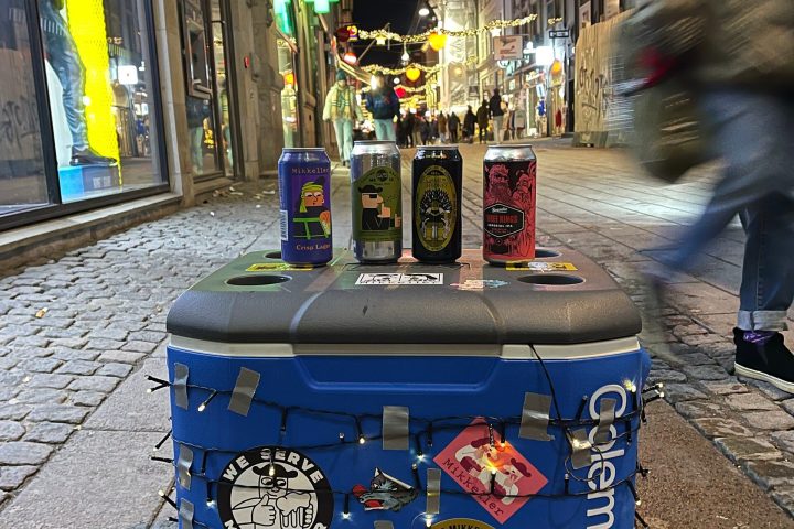 a blue suitcase on a street