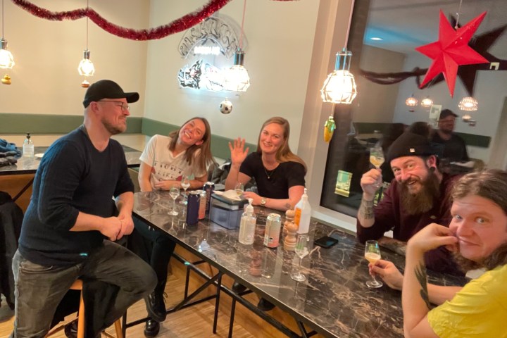 a group of people standing in a room