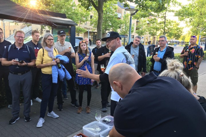 a group of people standing in front of a crowd