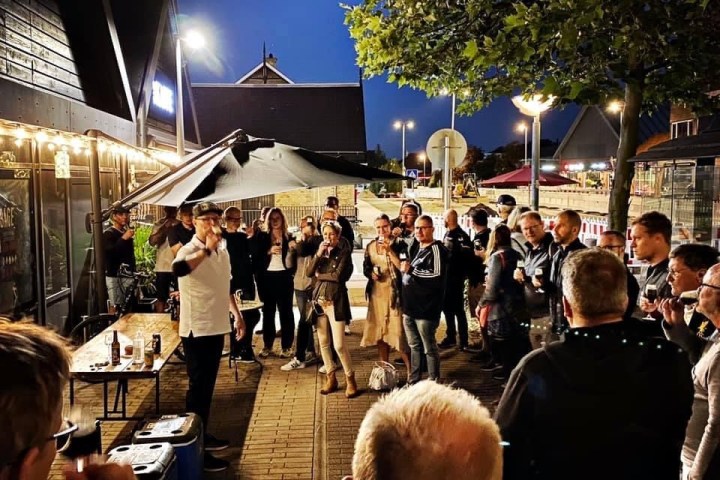 a group of people standing in front of a crowd