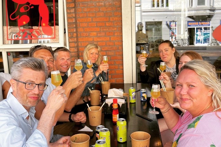 Andreas Mogensen et al. are drinking from the side of a building