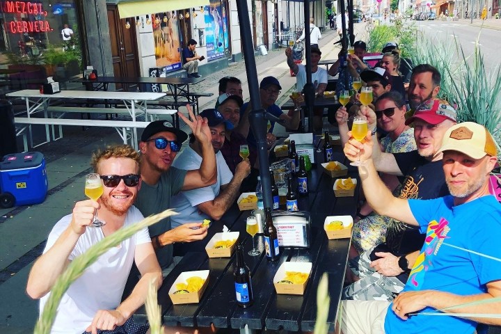 a group of people sitting in chairs in front of a crowd