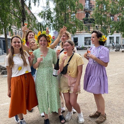 a group of people posing for the camera